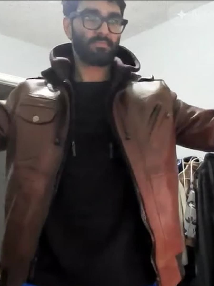 The same brown leather hooded bomber, generated live on the shopper.