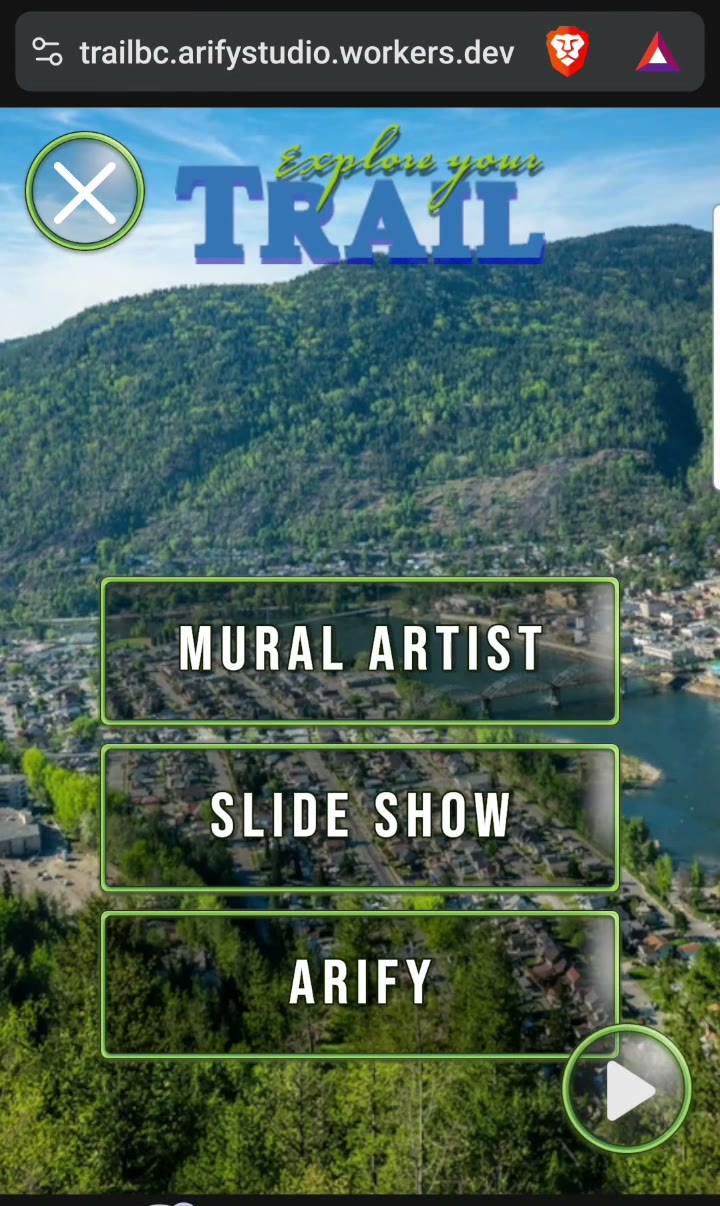The AR experience menu on trailbc.arifystudio.workers.dev, headed with Trail's own Explore your Trail branding, offering Mural Artist, Slide Show and ARify.